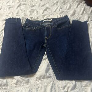 High waisted Levi’s dark wash jeans